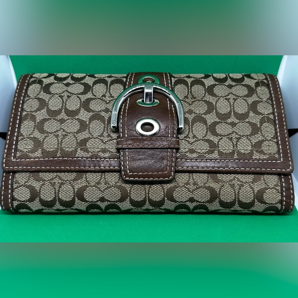 Vintage Coach Signature SoHo trifold wallet w/check book cover included.
